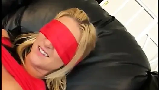 Blind-folded blonde gets a vibrator inserted in her tight pink pussy