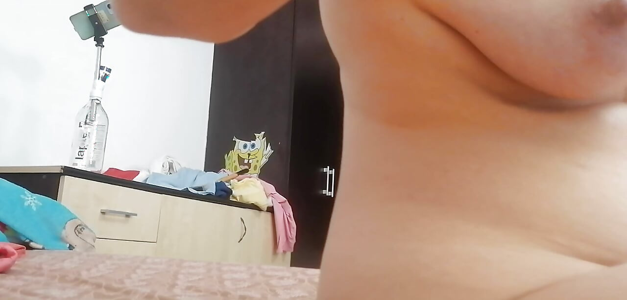 Amateur step-mom masturbates with her fingers in her pussy until orgasm. Amateur step-mom trying on clothes and cutting them.