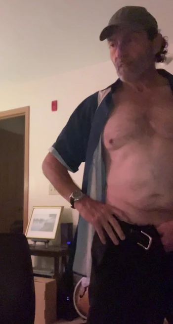 Just a guy getting home from work and getting naked.
