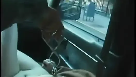 Commuter redhead carpools with creep who debases her in car in city traffic