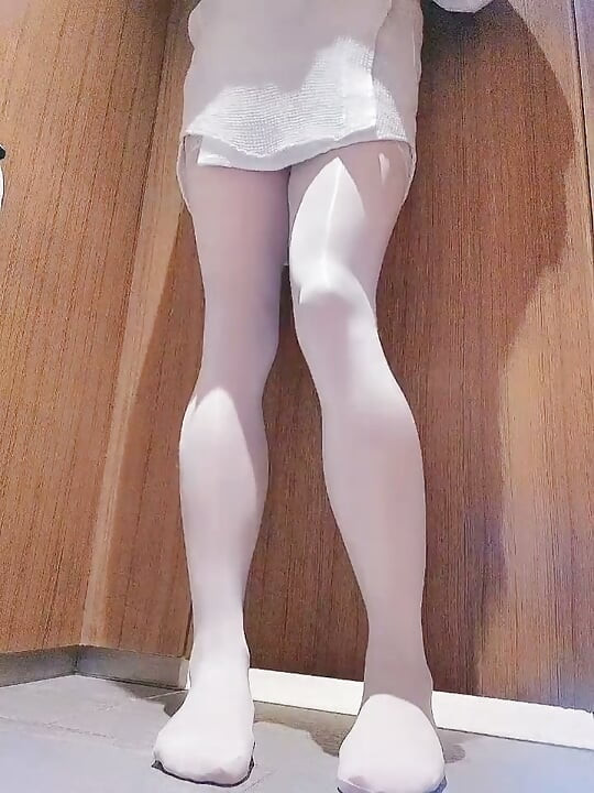 Risky exhibitions in public toilet are about to be caught. Tricky asian sissy in white nylons and schoolgirl's microskirt.