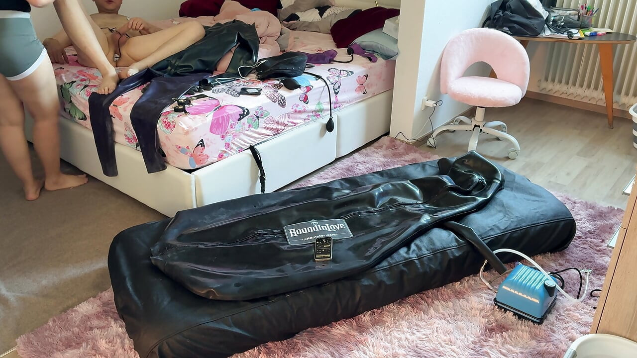 Wife drives her husband to orgasm with ESTIM in Inflatable Full Body Latex Bondage Bag. Restricted Breathing - Gagged  Butt Plug