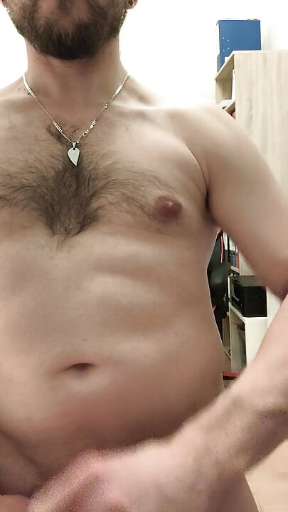 hairy guy poses and jerks off