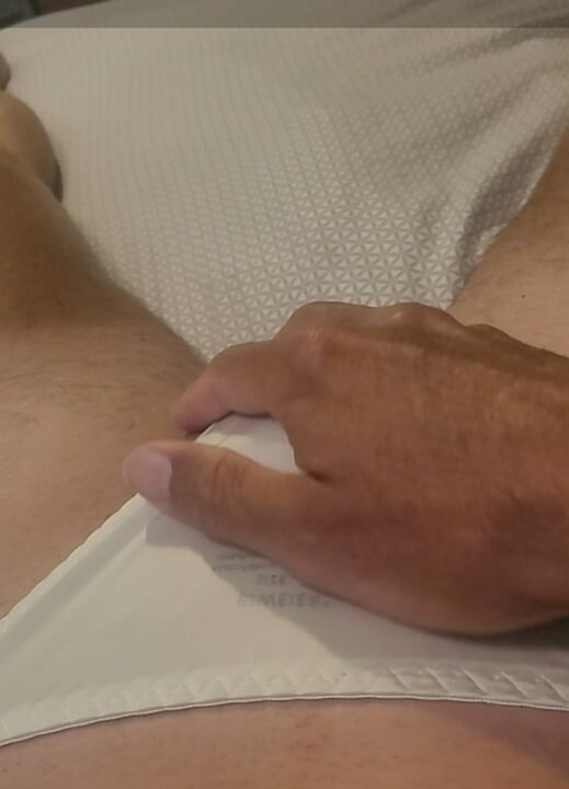 Sissy cums in his white satin panties.