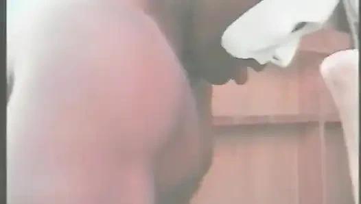 Muscular Stranger in White Superhero Mask Drills Ebony Chick on the Parking of Shopping Mall