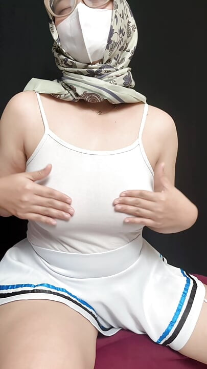 Hijab girl shows off chubby and plays with it