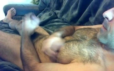 Sexy hairy man strokes