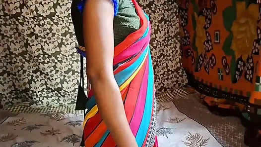 Auntie, clad in a red saree, approaches creating a beautiful and romantic moment filled with love anal sex