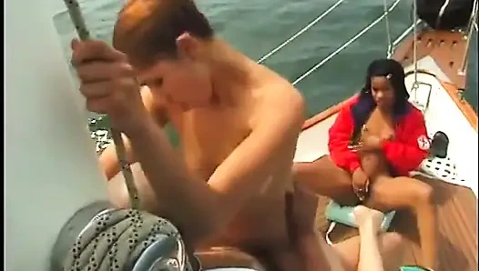 Couple of nice ebony babes are doing one cock on the deck of sailing ship