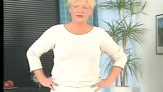 Blonde gilf wearing stockings while dildoing pussy