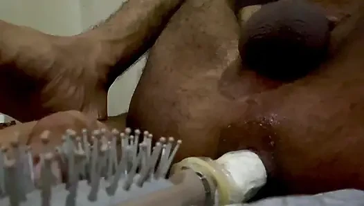 Anal play with hair brush