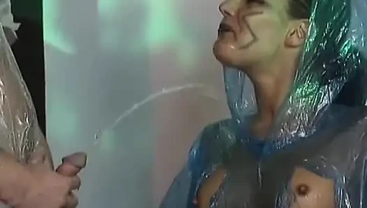 German Couple in Rain Jackets Having so Much Fun in Pee Session