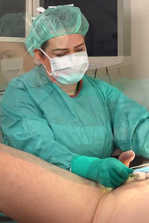 Klinkend Met Steriele Operatielatex Handschoenen En Jurk.