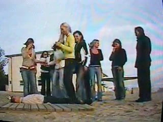 14 girls trample man under board