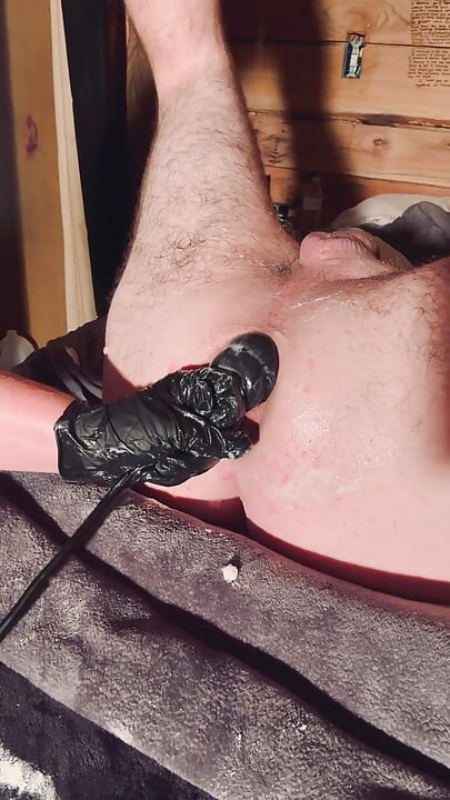 Fisted hard forced to piss all over myself
