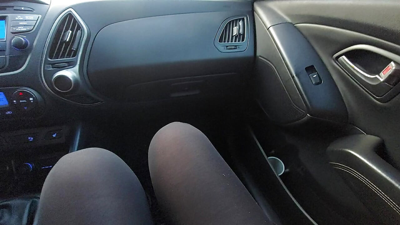 Elegant mature woman takes a taxi in the morning to go to the office.