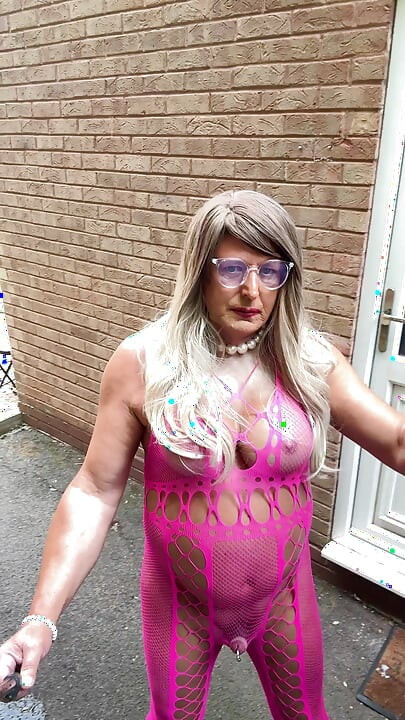 Sexy Crossdresser Kellycd2022's in pink fishnet catsuit and heels