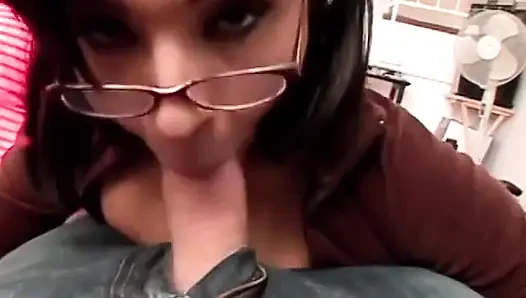 Sexy babe in glasses gives head to this dude with the long dong