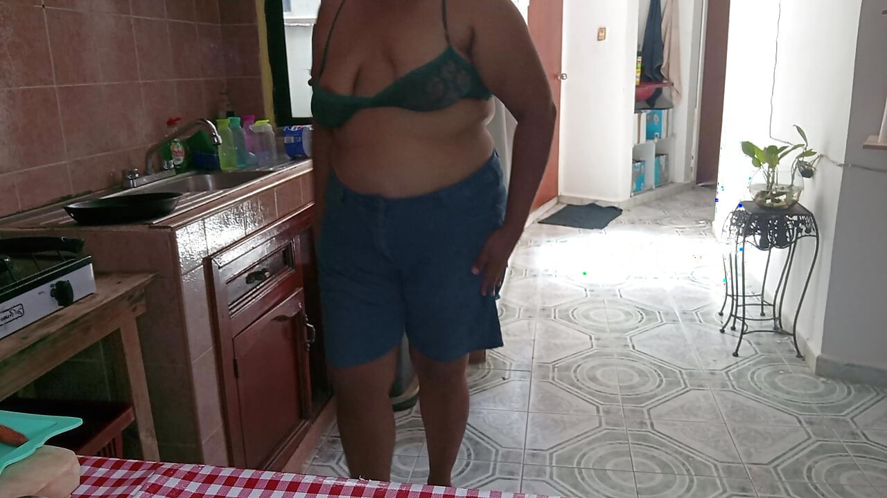 Mom in the kitchen in bralett