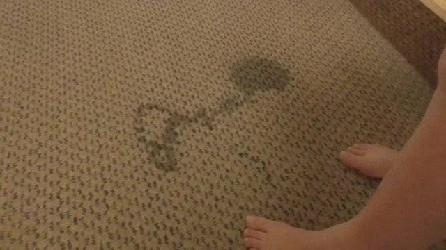 Pissing in hotel corridor