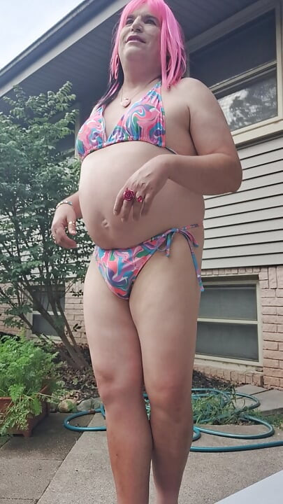 Feeling horny in my new bathing suit outside on the patio!