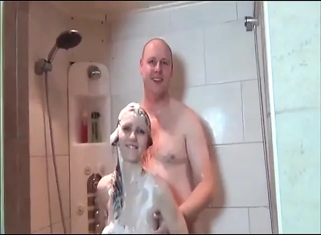 Sexy brunette teen wanks guy's pecker in the bathroom