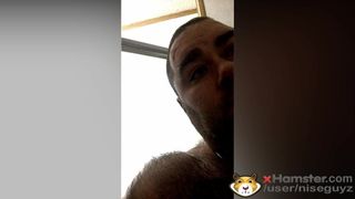 Fat hairy guy stroking and cumming in the shower.