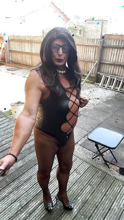 Sexy Crossdresser Kellycd2022's in black pvc bodysuit and fishnet pantyhose