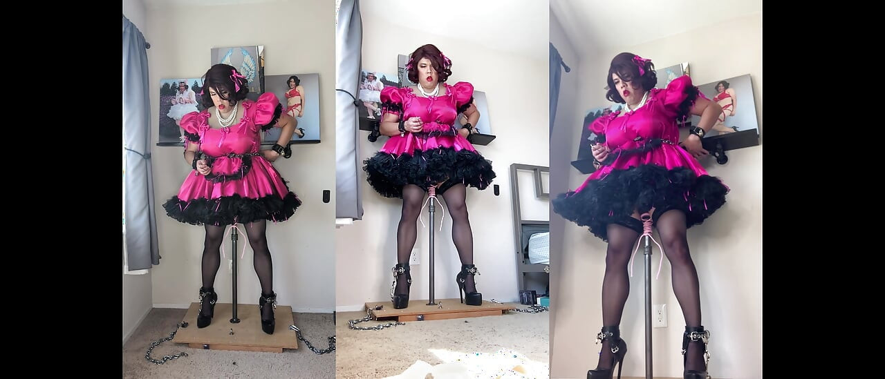 粉色娘娘腔女仆candy被锁在她的假阳具架上并骑乘她的杆子