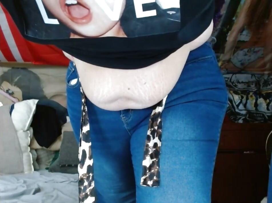 fat sissy with tits wearing and stripping out them tight jeans