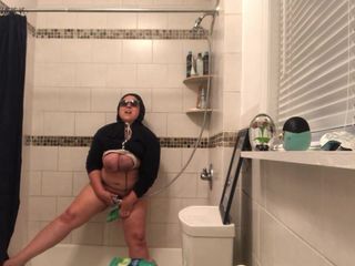 Masturbating with shower head and small broom