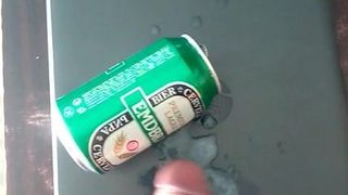 Cumming on can of beer