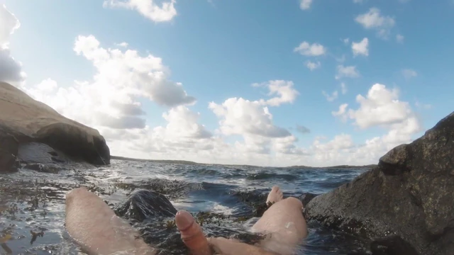 Jerking off by the sea