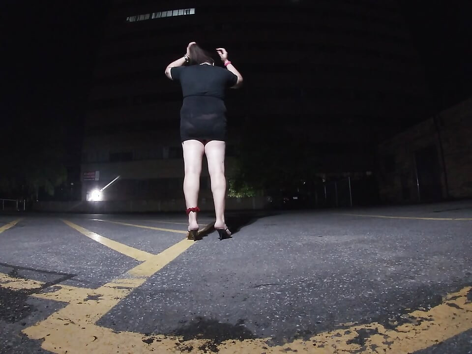 Solo feminized Mature CD goes for a walk in a parking lot