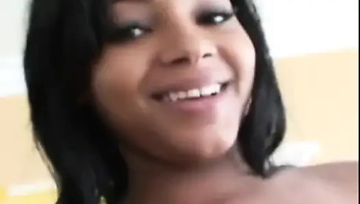 Ebony young bitch with big boobs takes a nice white cock