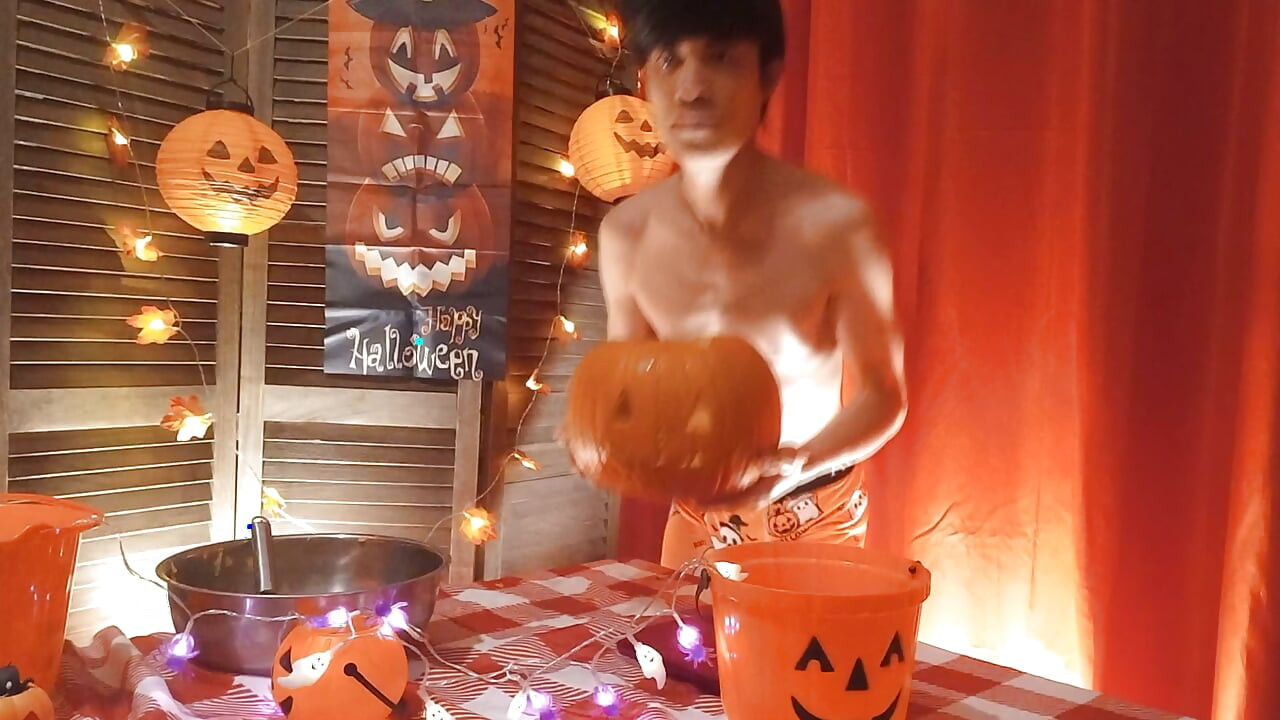 Cute twink Jon Arteen performs a sensual dance while carving a Halloween pumpkin