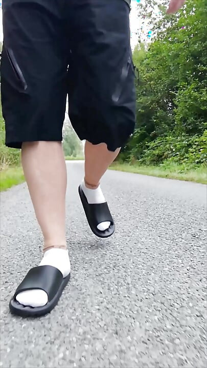 In Slippers and White Socks in Nature
