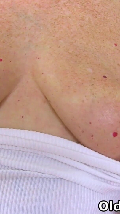 English gilf Sensual Caroline stimulates her shaven cunny till she is soaked and ready to cum | Clip 1