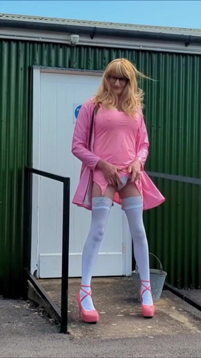 Emotional moment from "Tranny Gina In Pink PVC Dress Masturbating, Cumming"