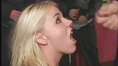 Sexy Blonde Beauty Drops to Her Knees and Blows a Room Full of Weirdos