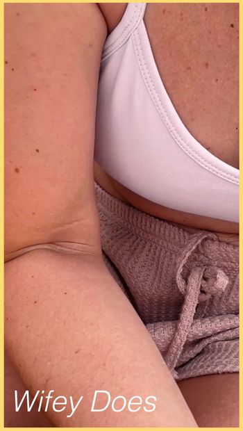 Wifey shows perfect cleavage in this tight white sports bra check out this hot MILF amazing cleavage