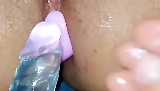 Greedy wife explores new sex toys (part 2): two vibrators in her pussy and butt plugs (both went in, the small and the big)