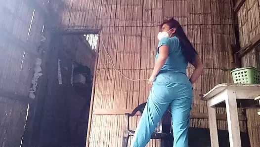 Mature nurse moisturizes her wrinkled skin with moisturizing cream