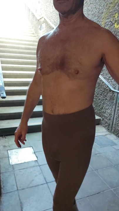 Barefoot and topless through the tunnel