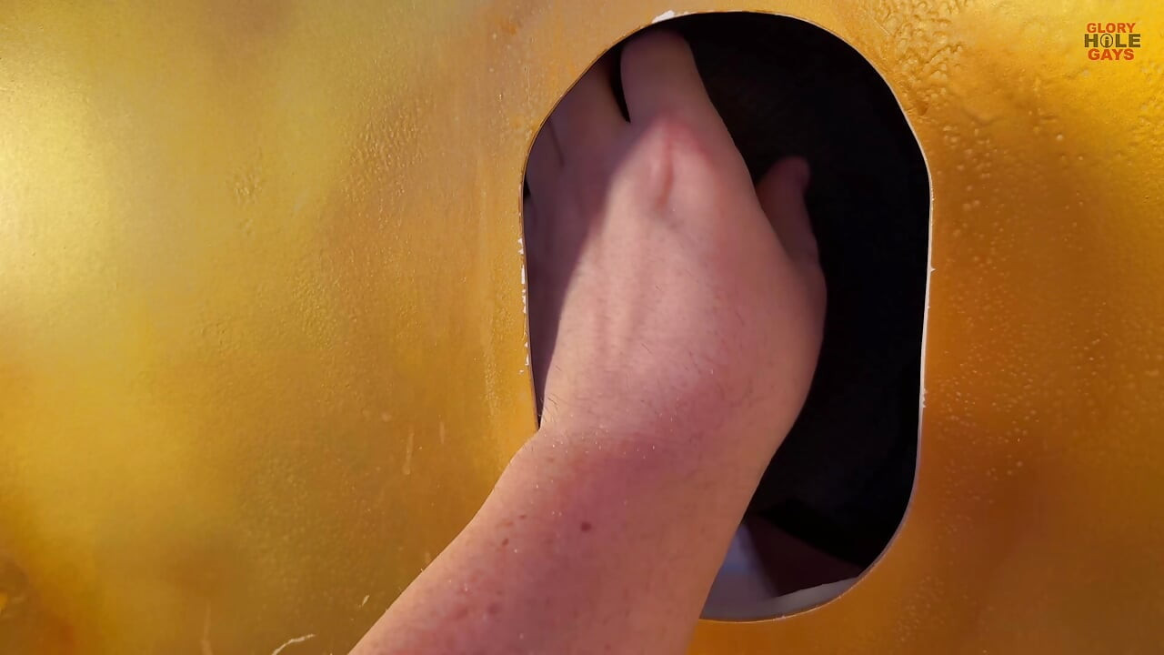 Huge thick cock shoots a massive load of cum at the golden gloryhole