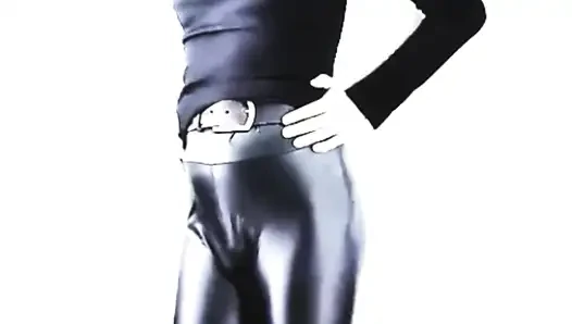 Crossdresser shakes his ass on webcam and dance hot in skin tight Latex Leggings with small cock