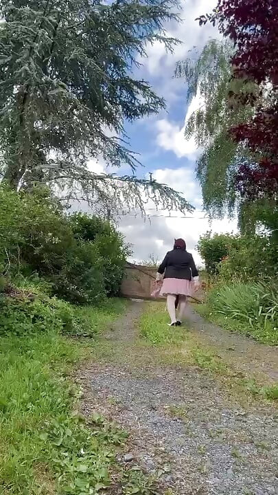 Dressed in a pink polka dot skirt for a party