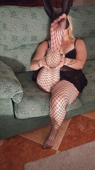 Hot sexy blonde in fishnet