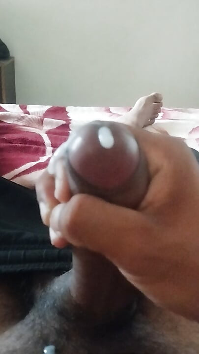 Masturbating