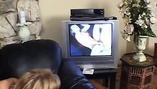 Cute blonde deep throats stud while another guy is watching them